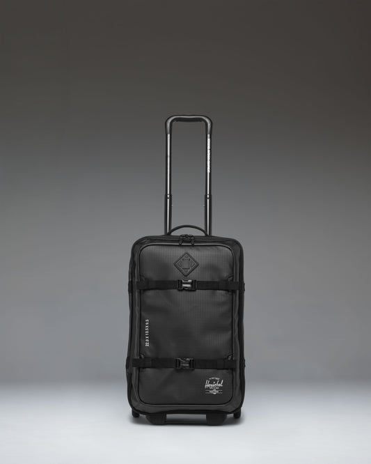 Herschel Supply Co. All Season Hybrid Roller Bag Large Carry On in black, showing the front exterior view of the luggage.