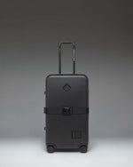 Herschel Supply Co. Heritage Hardshell Medium Luggage Exp in black.