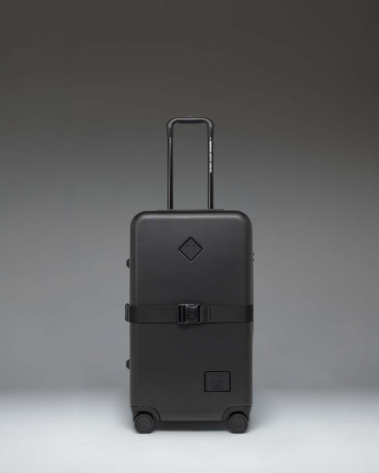 Herschel Supply Co. Heritage Hardshell Medium Luggage Exp in black.