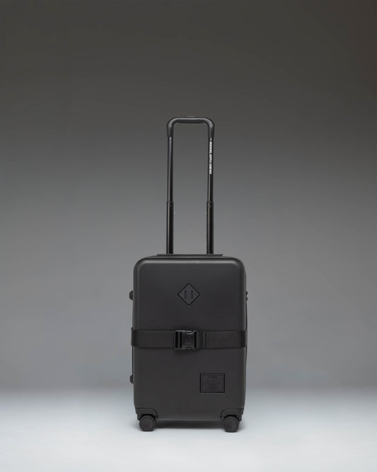 Black Herschel Heritage Hardshell Large Carry On Exp suitcase in Black, front view.