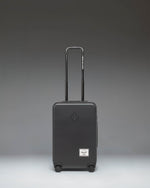 Black Herschel Heritage Hardshell Large Carry-On Luggage.
