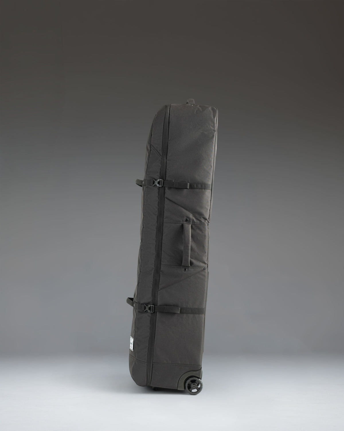 Herschel Heritage Golf Travel Wheelie Bag in black.