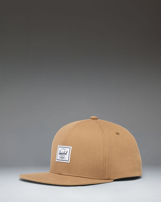 Herschel Supply Co. Whaler 6 Panel Cap in Antique Bronze, a structured mid-profile snapback hat.