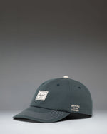 Herschel Supply Co Sylas Premium Cap in Green Gables dark green with vintage white stitching.