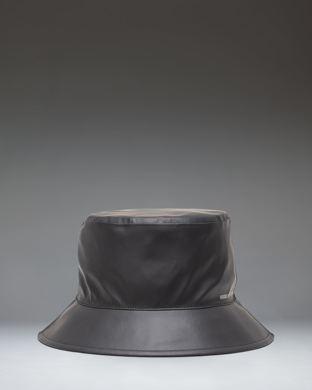 Herschel Supply Co. Norman Rain Bucket Hat in Black size guide chart showing measurements for all available sizes.