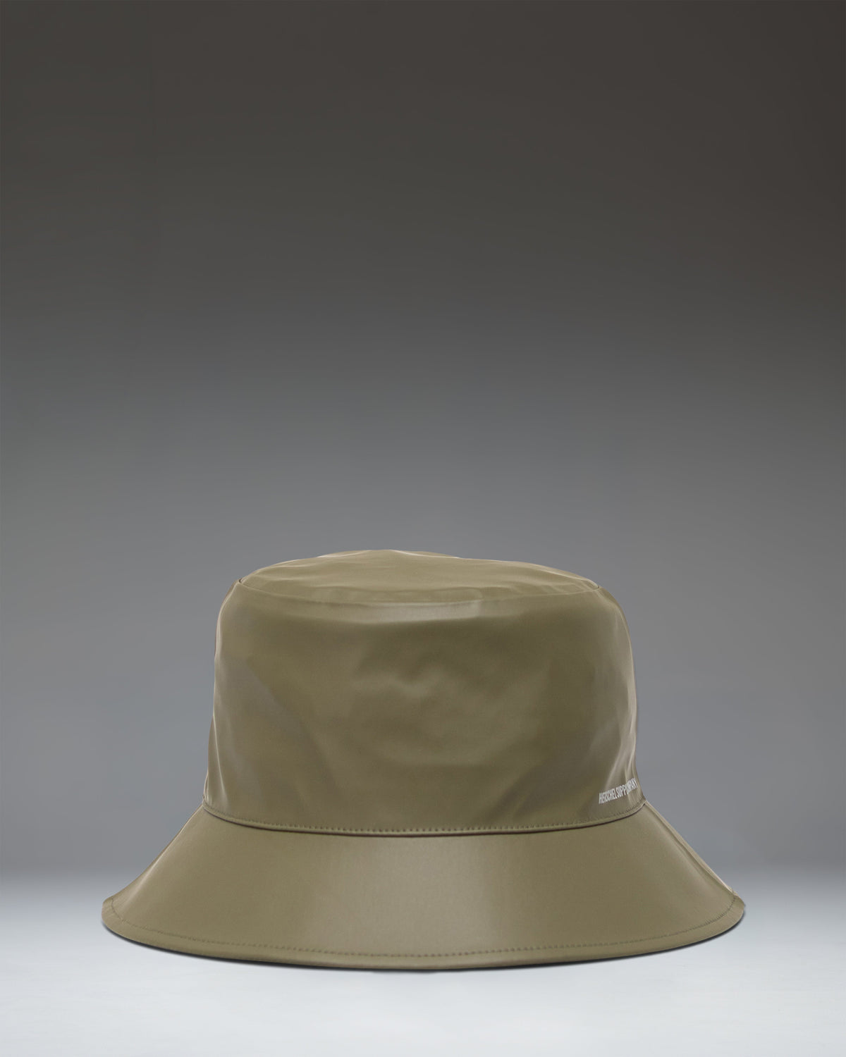 Herschel Supply Co. Norman Rain Bucket Hat in Ivy Green, showcasing a flat lay view of the waterproof fabric and wide brim.