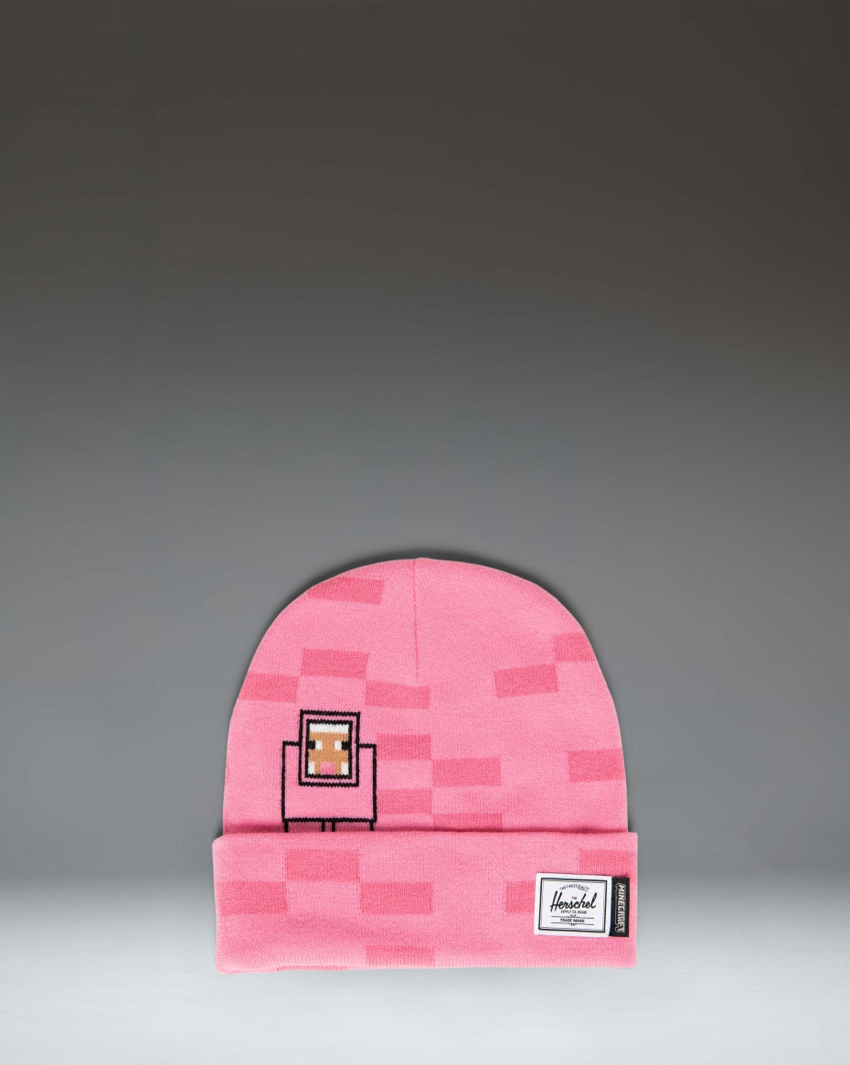 Herschel Supply Co. Minecraft Elmer kids beanie in Pink Sheep pink with a cuffed design.