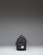 Herschel Classic Backpack Bag Charm in black, showing the front view of a miniature backpack keychain accessory.