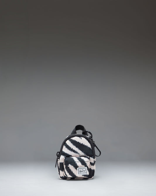 Herschel Classic Backpack Bag Charm in a striking black and white zebra print pattern.